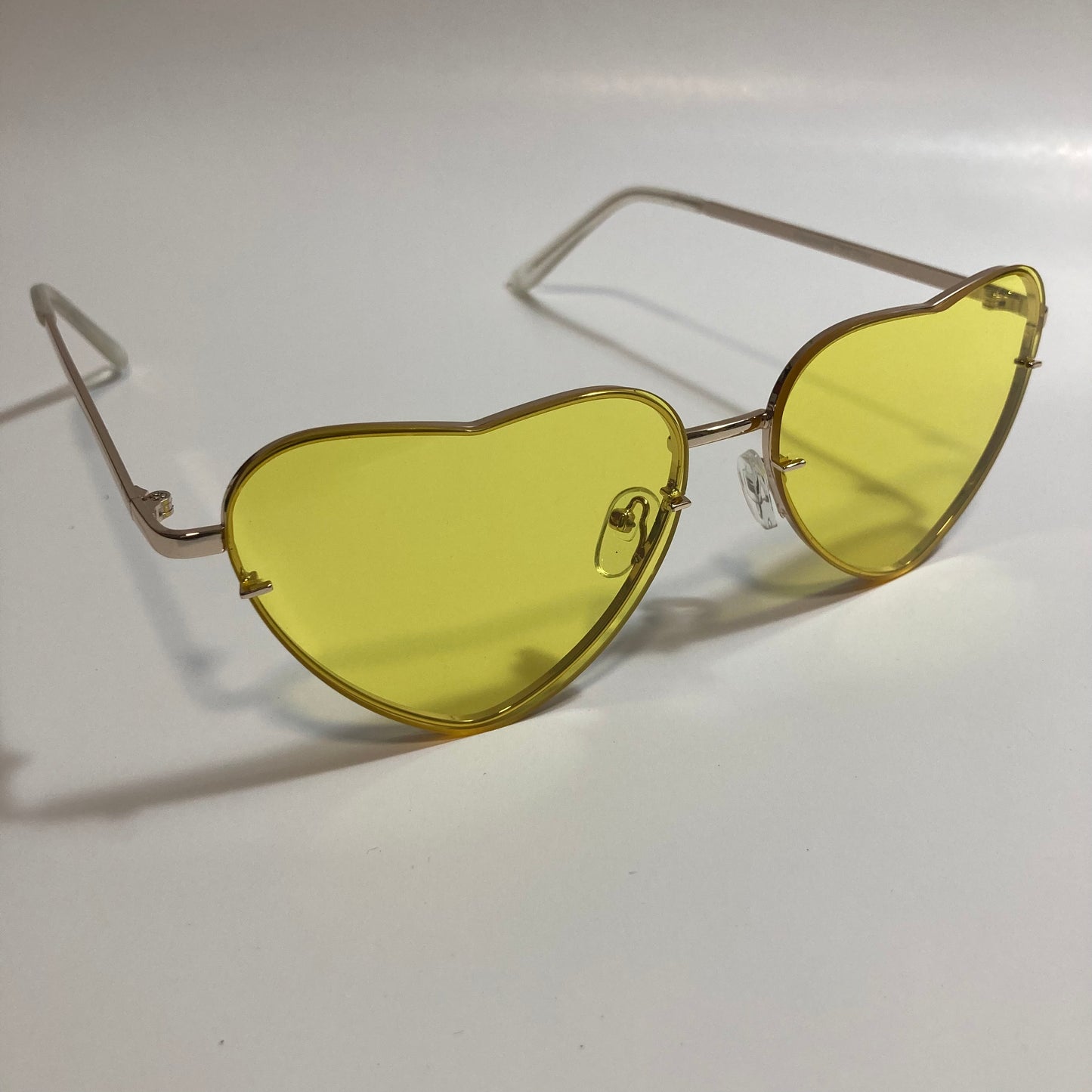 yellow and gold heart shape sunglasses