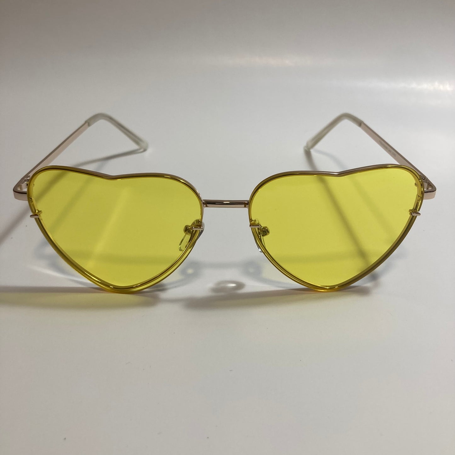 yellow and gold heart shape sunglasses
