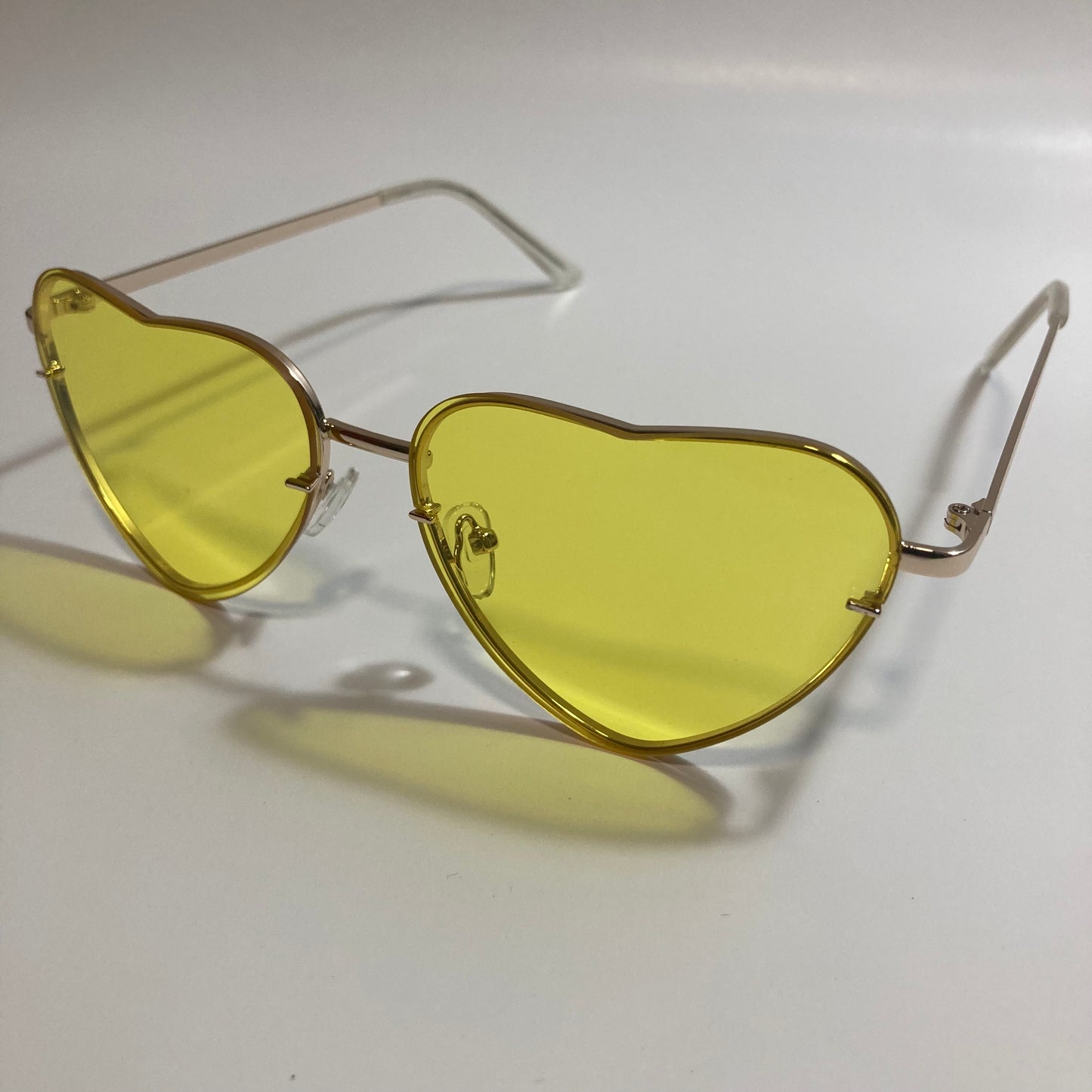 yellow and gold heart shape sunglasses