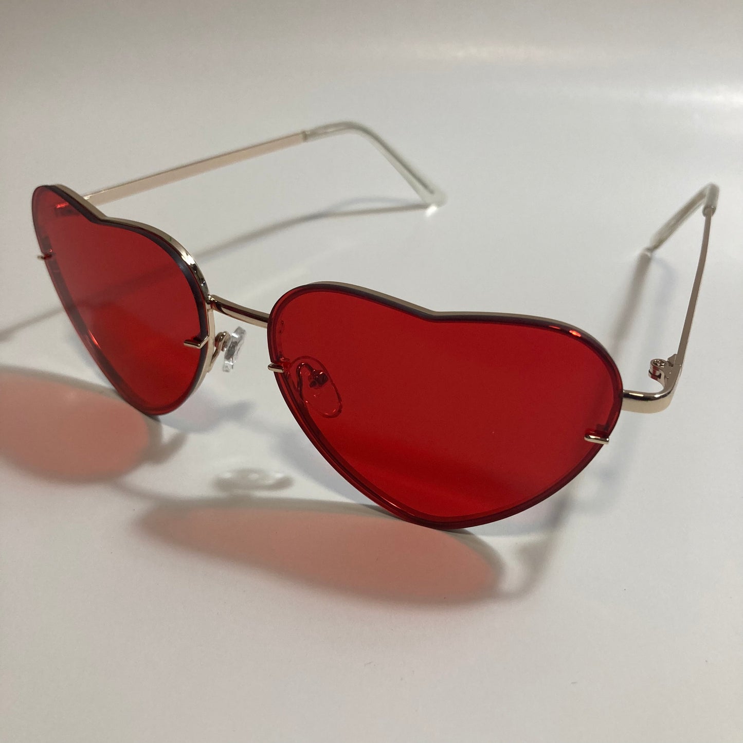 red and gold heart shape sunglasses