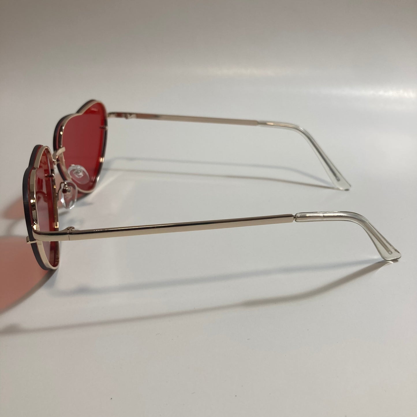 red and gold heart shape sunglasses