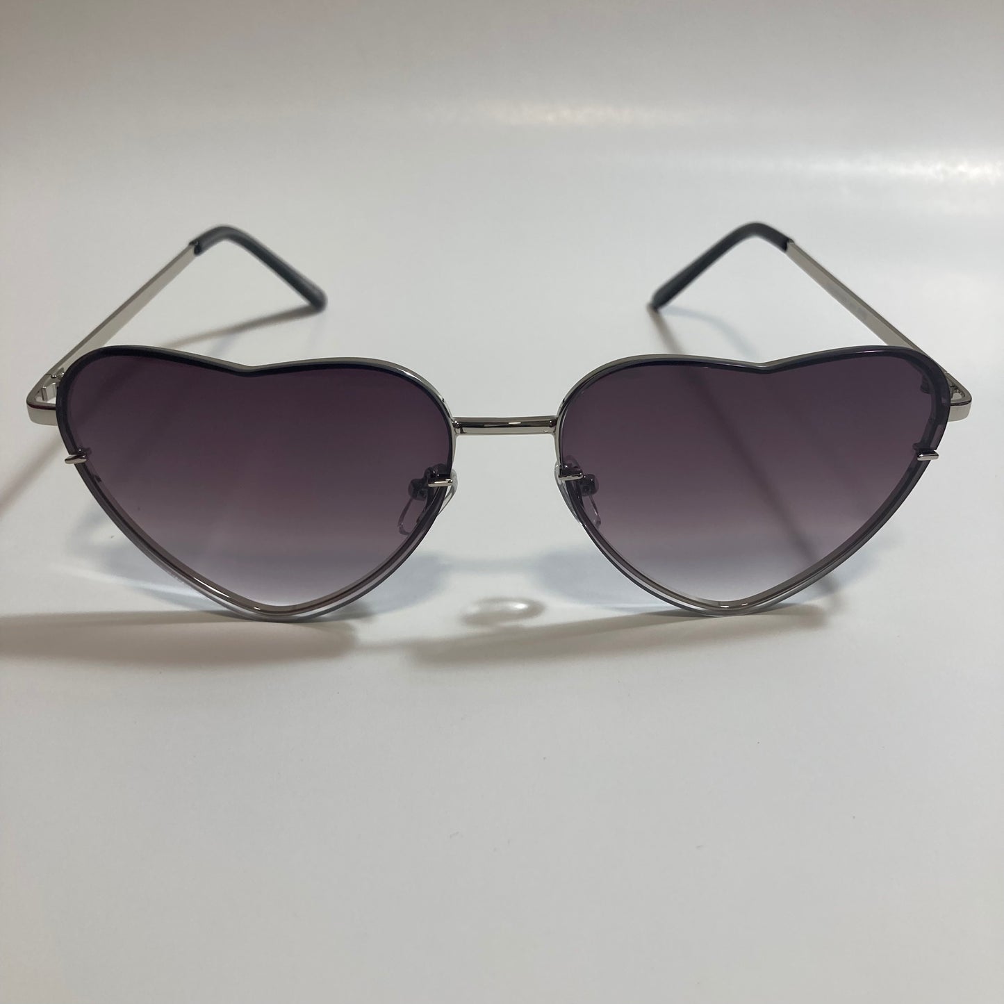 black and silver heart shape sunglasses