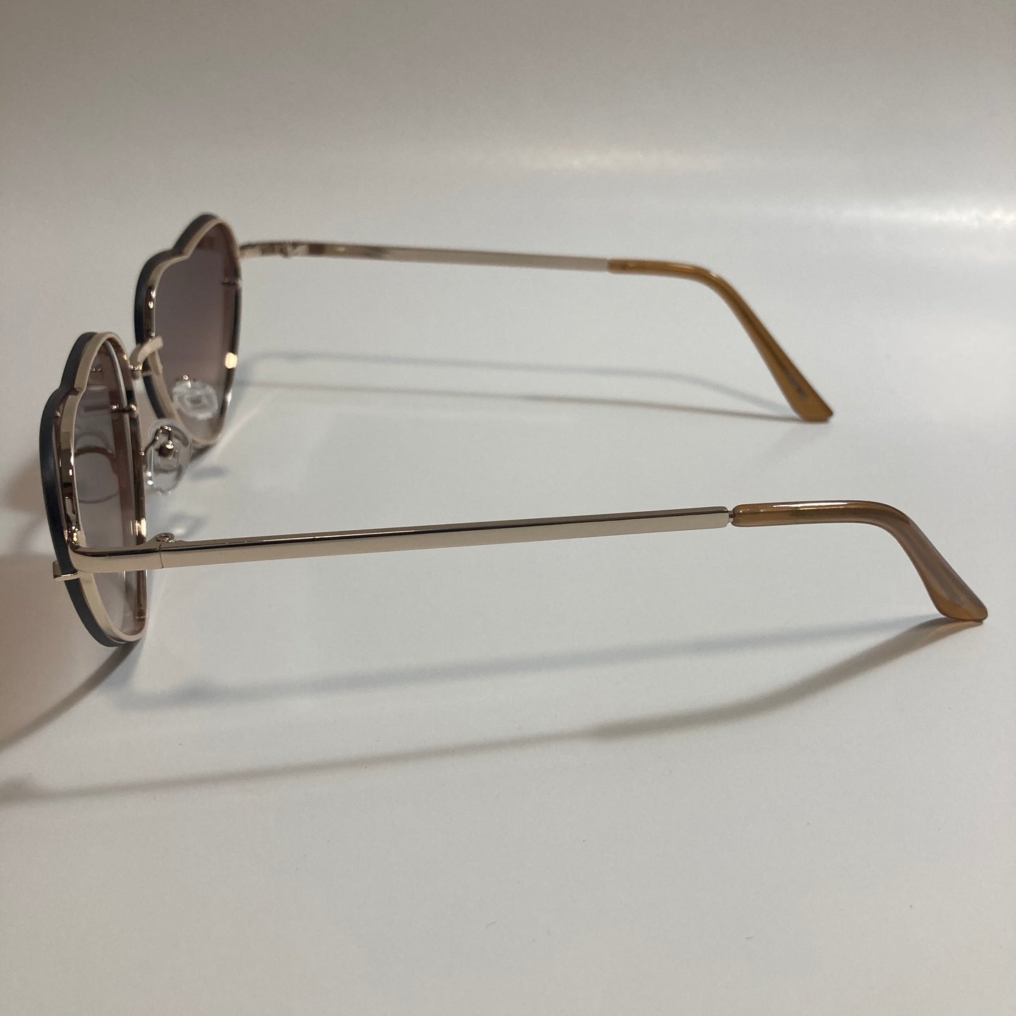 brown and gold heart shape sunglasses