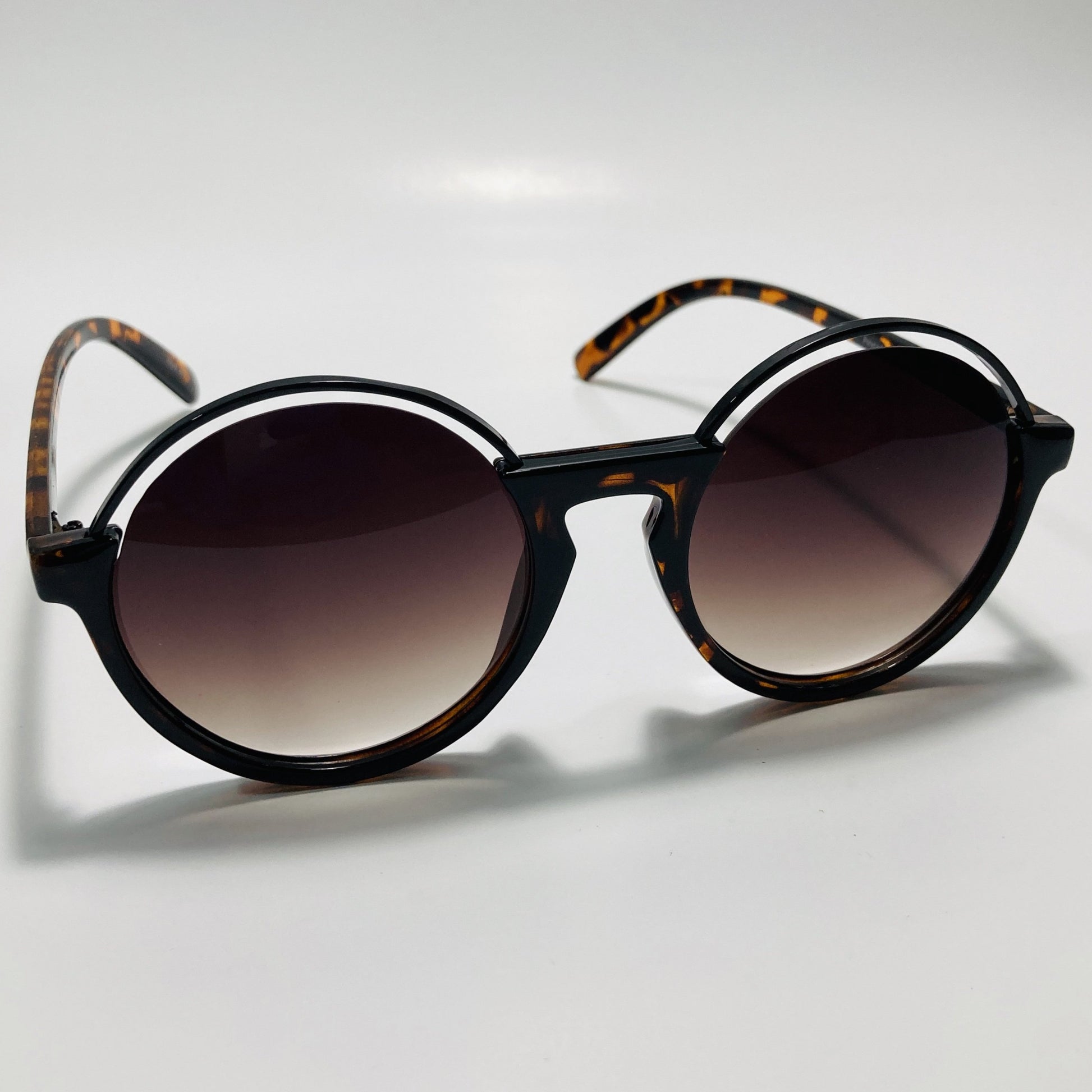 womens brown and gold round sunglasses