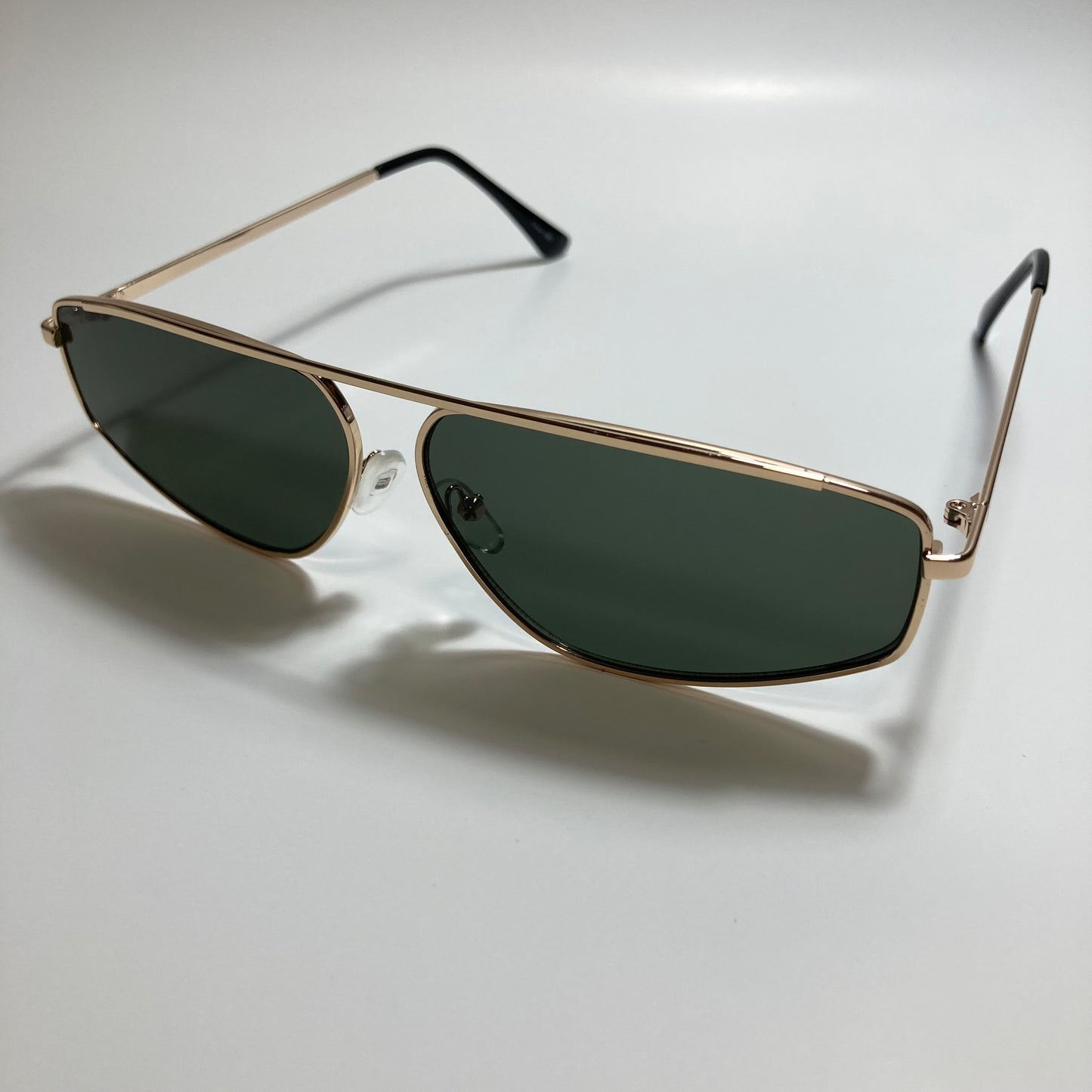 mens and womens green and gold futuristic sunglasses