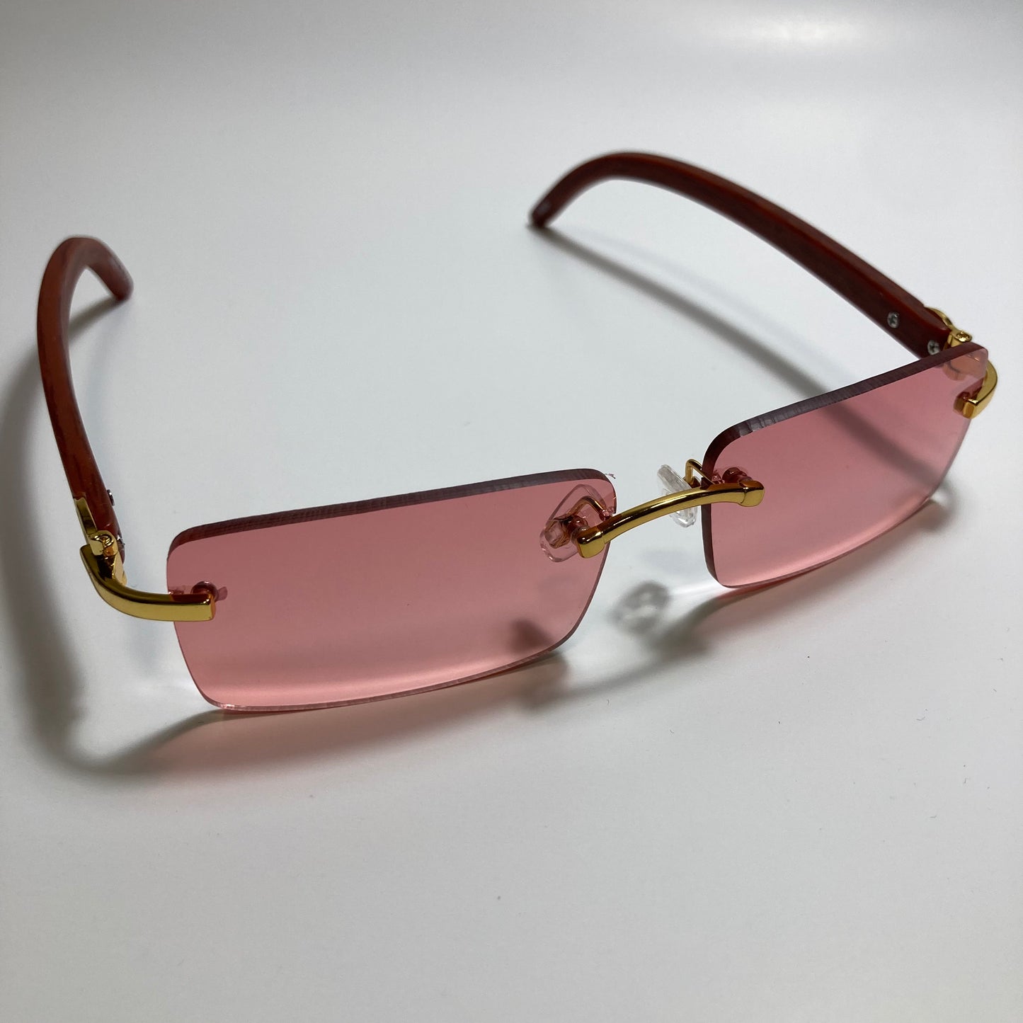 mens and womens red rimless square sunglasses