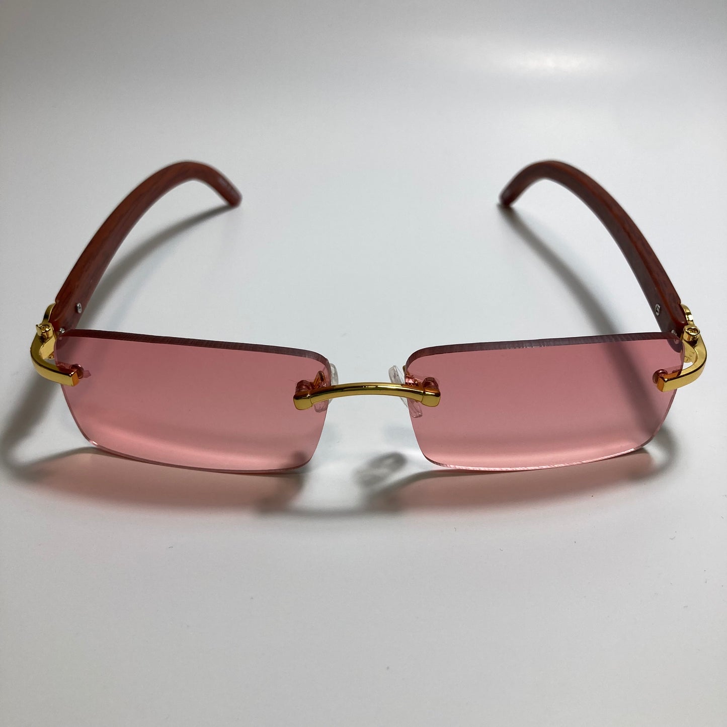 mens and womens red rimless square sunglasses