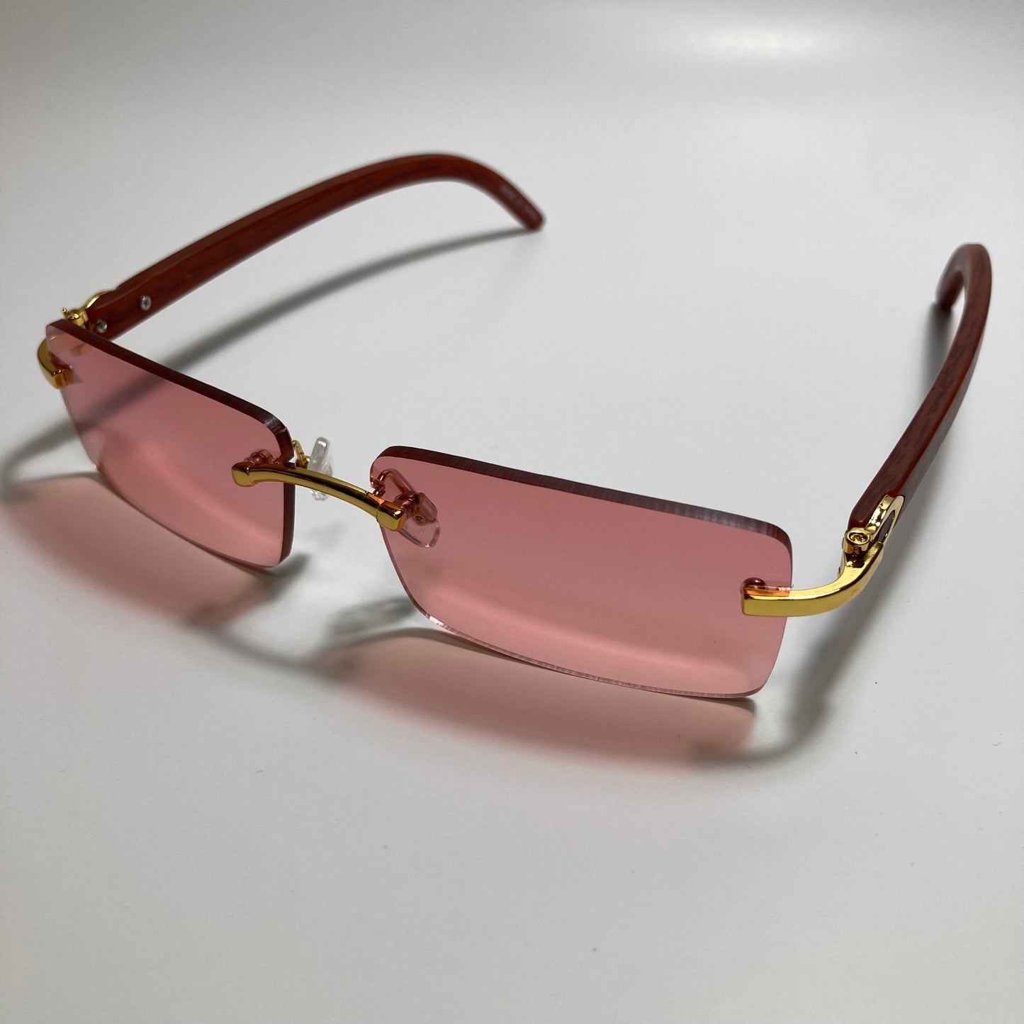 mens and womens red rimless square sunglasses