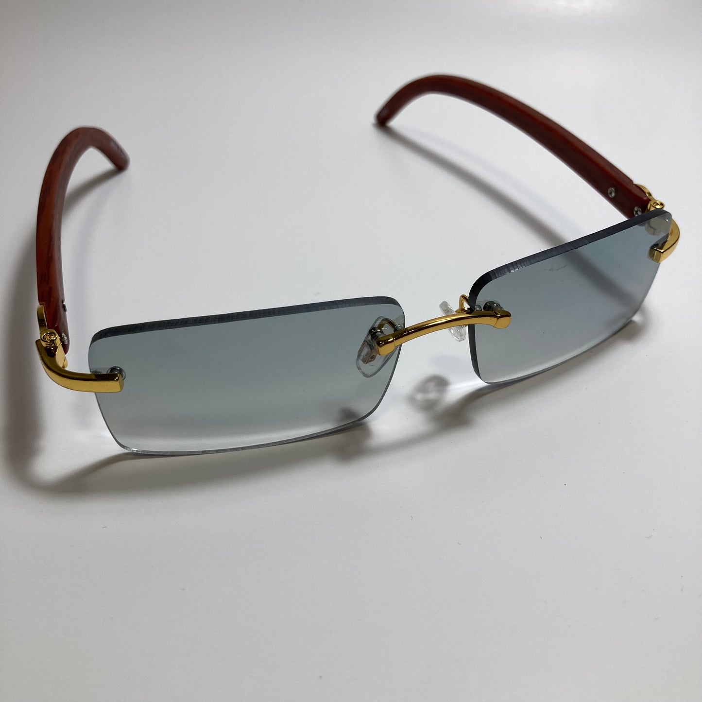 mens and womens green rimless square sunglasses
