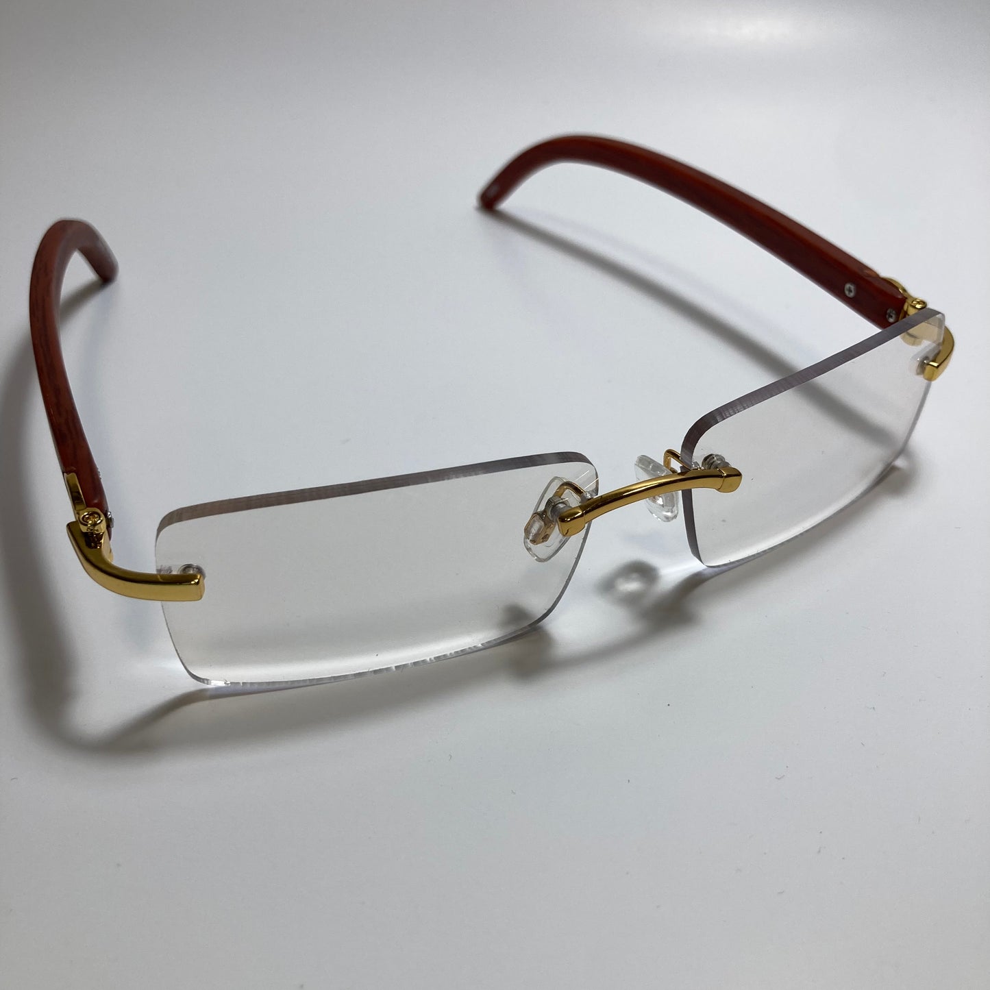 mens and womens clear rimless square sunglasses