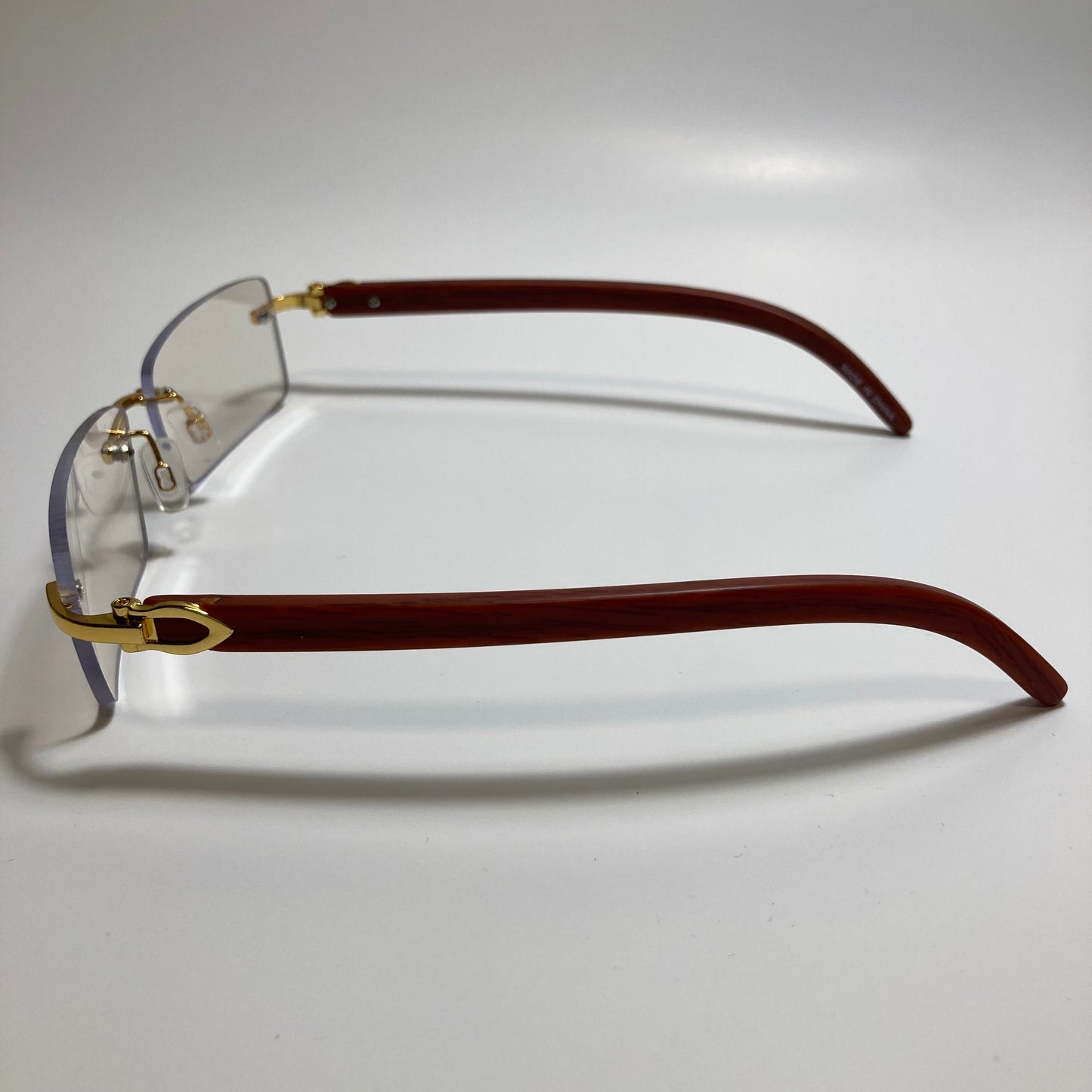 mens and womens clear rimless square sunglasses