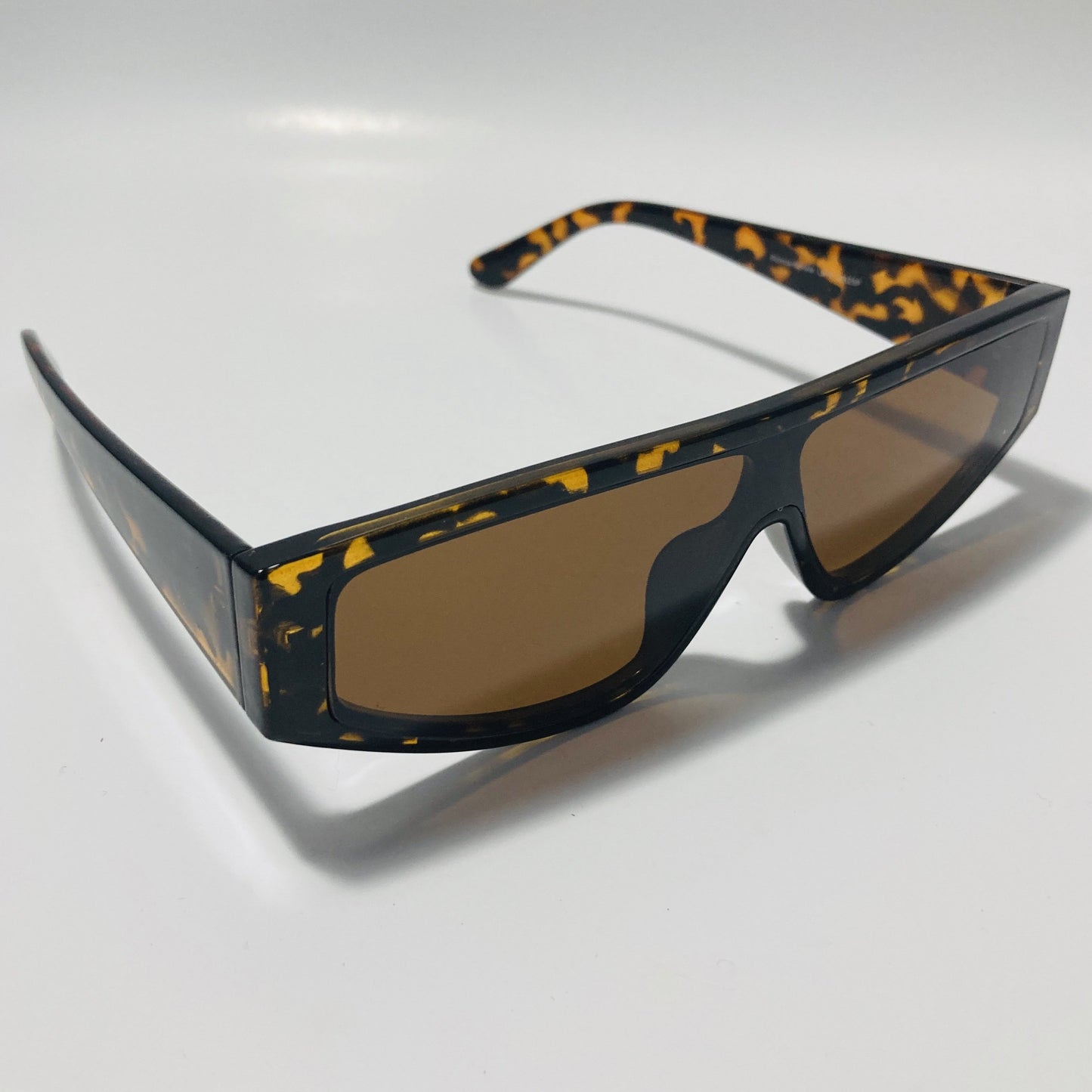 mens and womens brown futuristic sunglasses with brown lenses