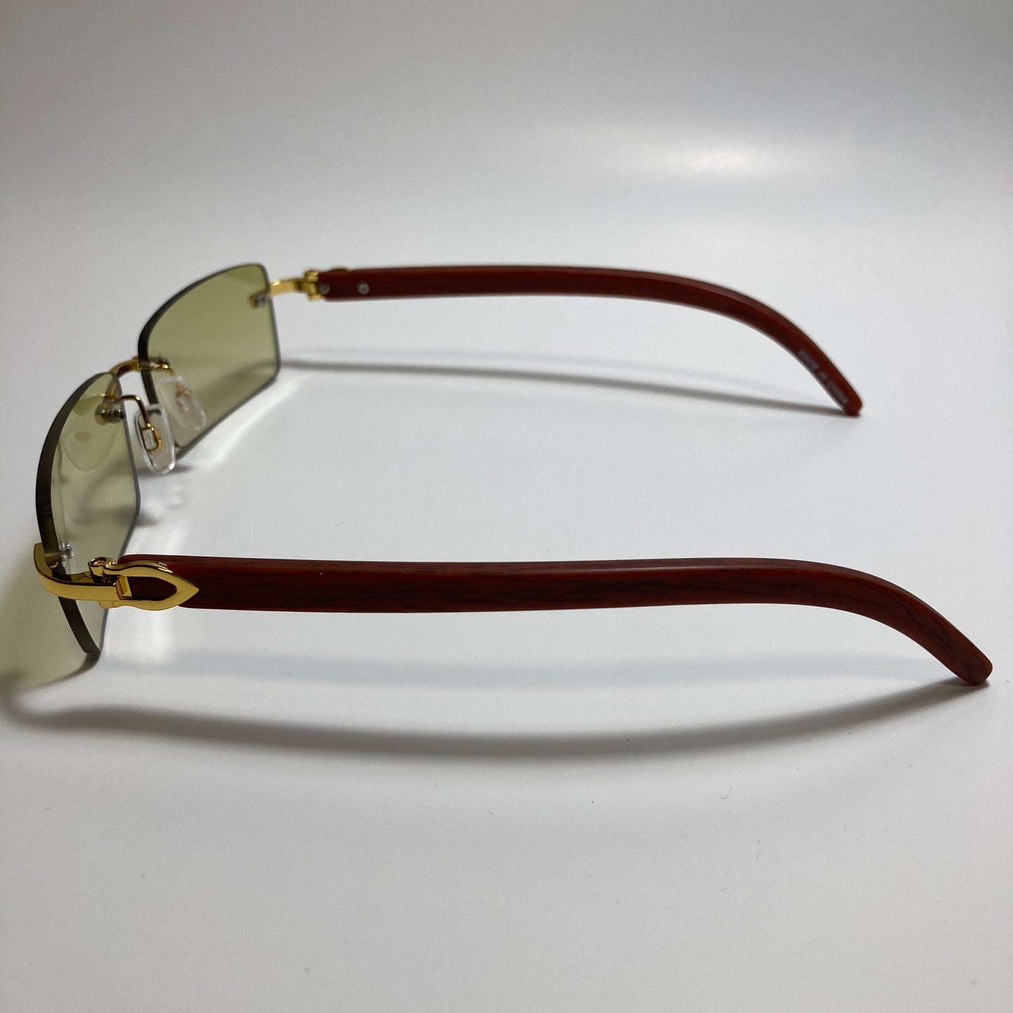 mens and womens yellow rimless square sunglasses