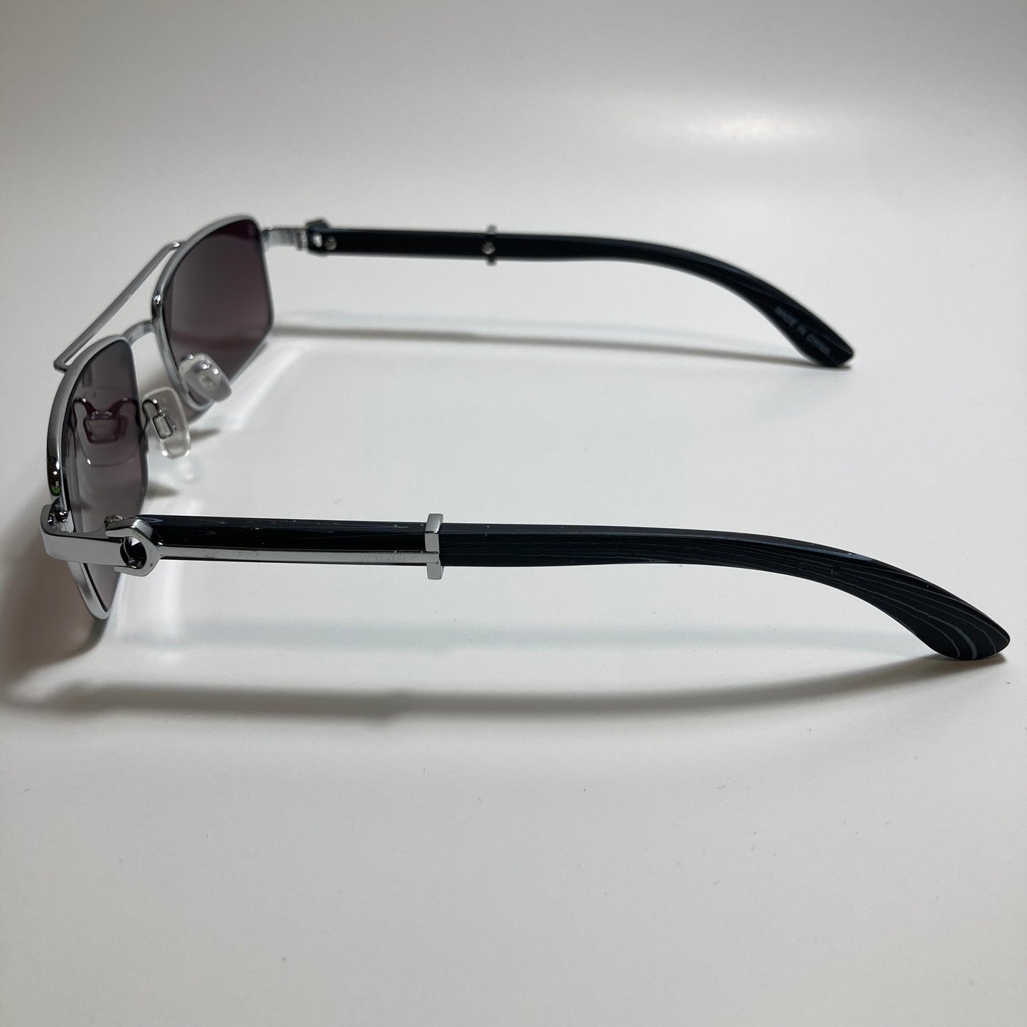 womens and mens black and silver square metal sunglasses