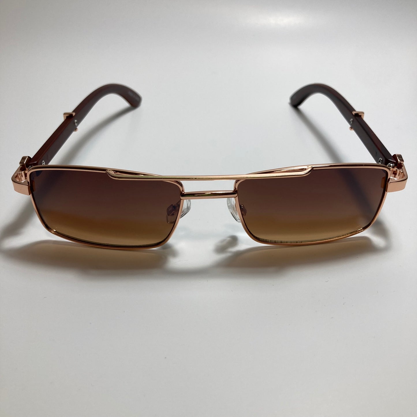 womens and mens brown and gold square metal sunglasses