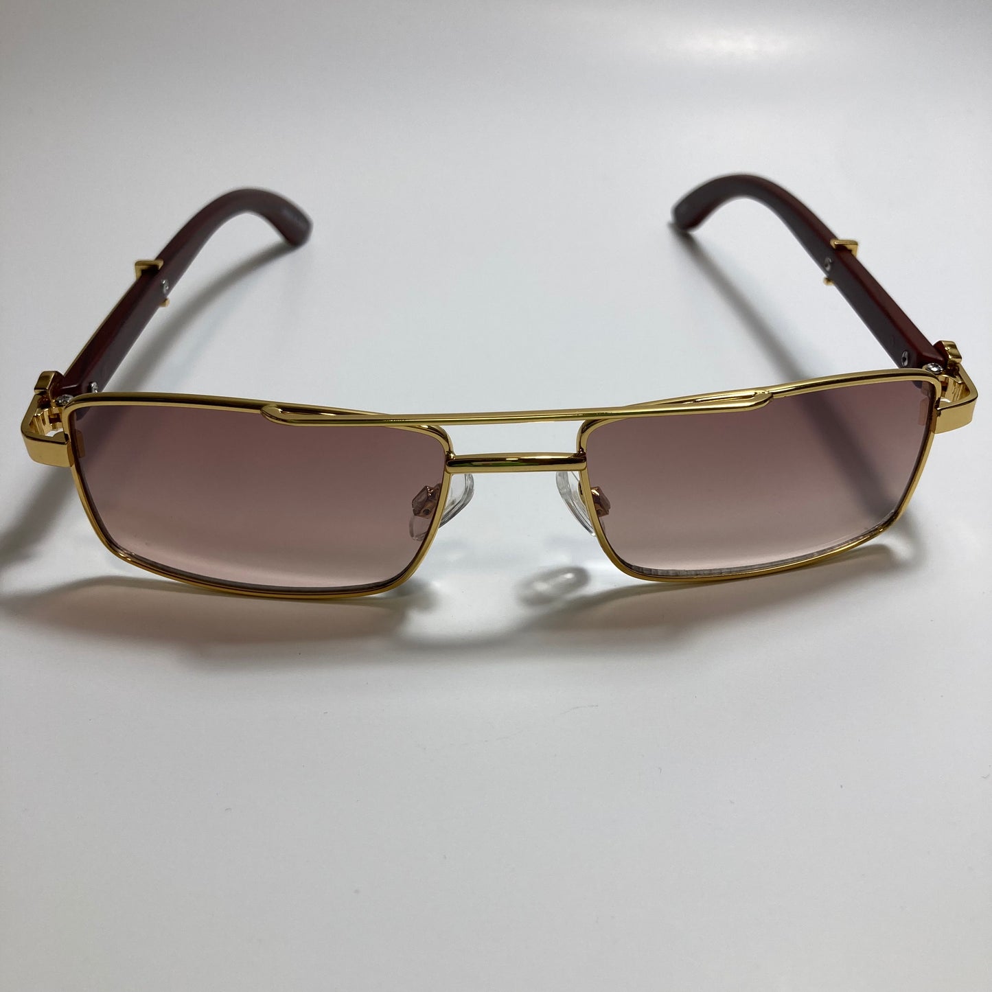 womens and mens brown and gold square metal sunglasses