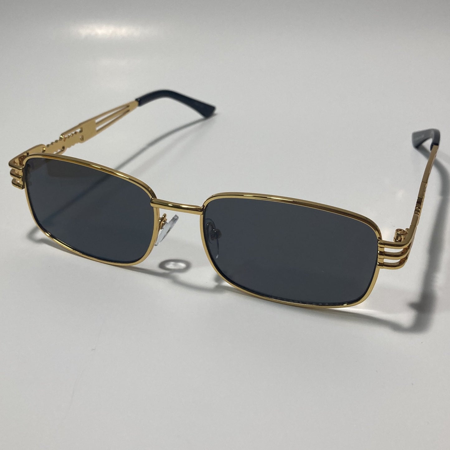 mens and womens gold square sunglasses with black lenses