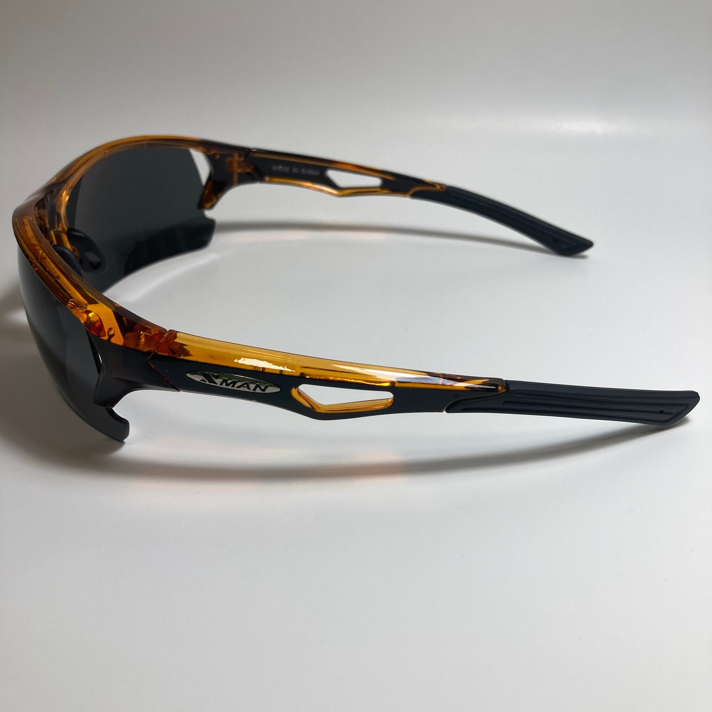 mens orange and black wrap around sunglasses