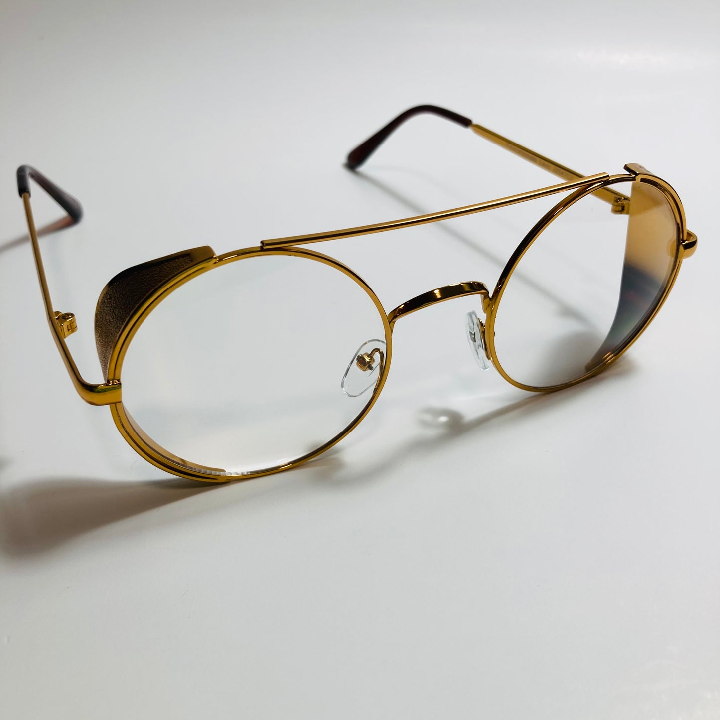 mens and womens gold round glasses with side shields