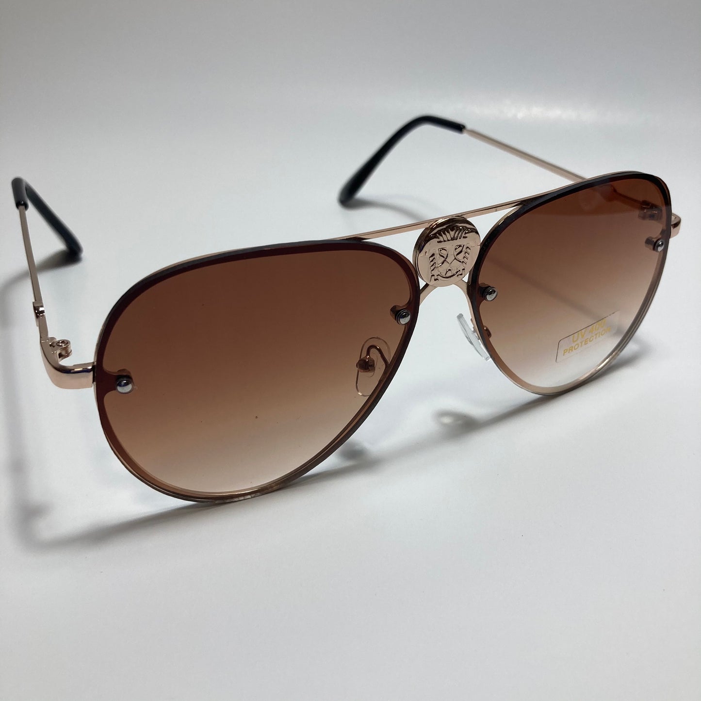 mens and womens gold and brown aviator sunglasses