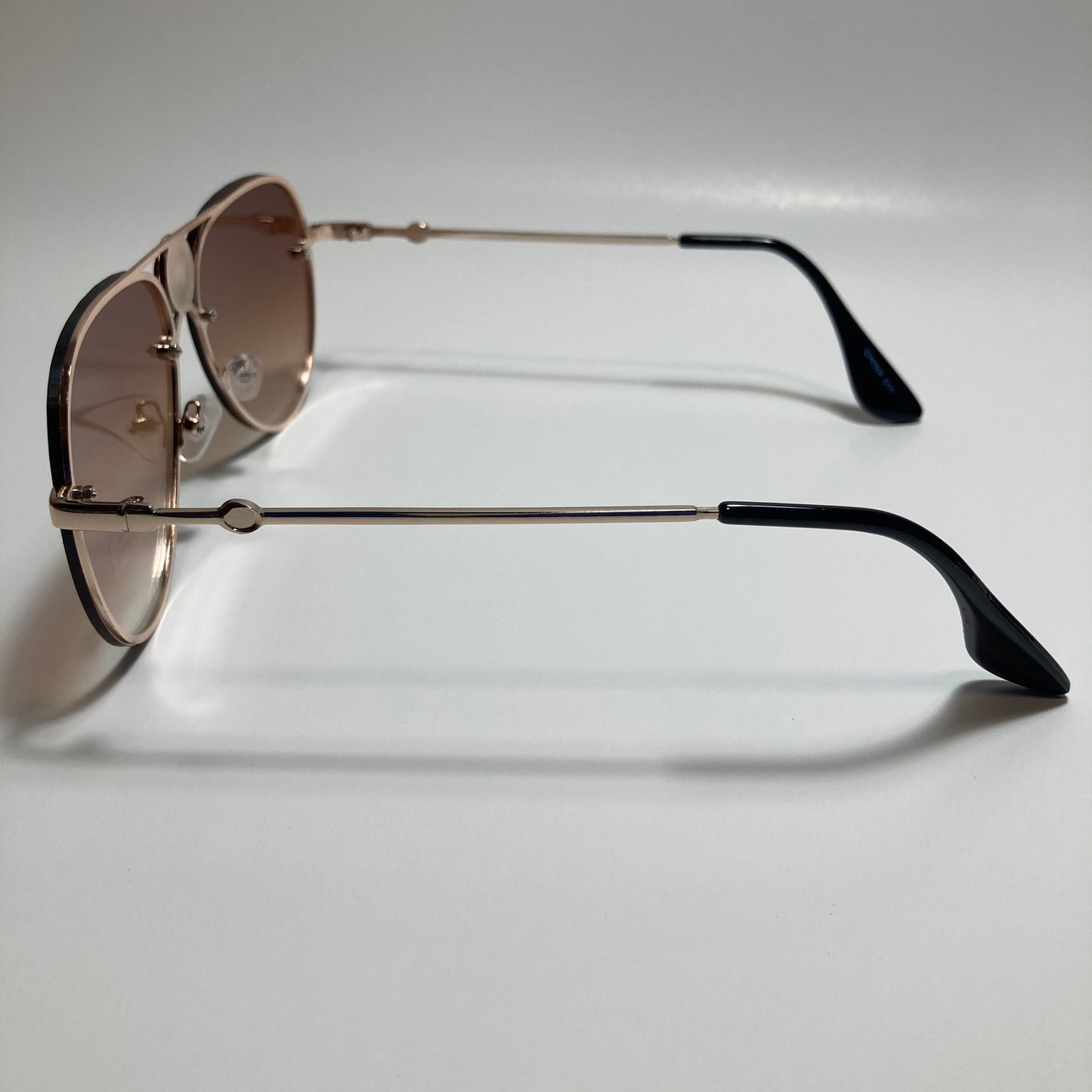 mens and womens gold and brown aviator sunglasses