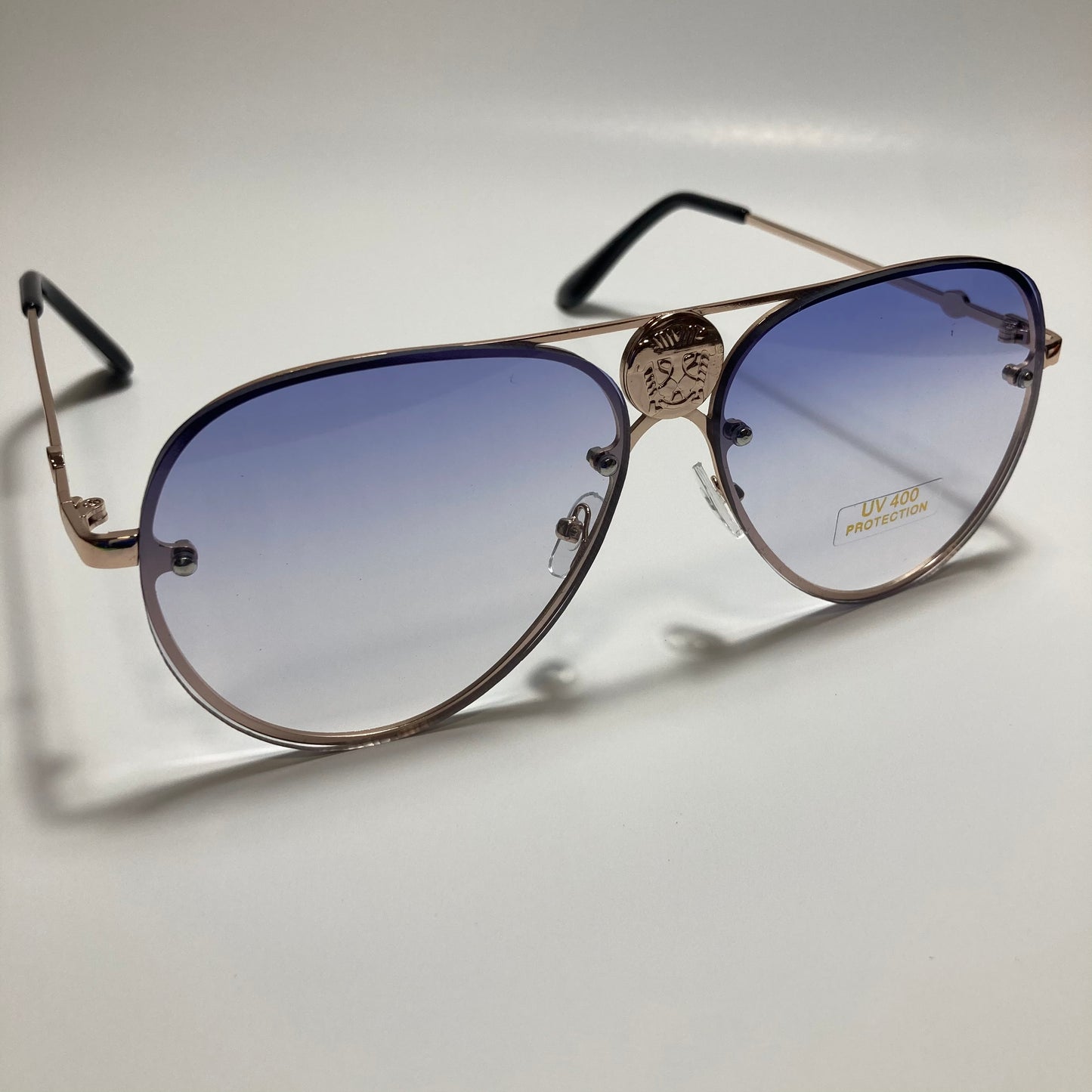 mens and womens gold and blue aviator sunglasses