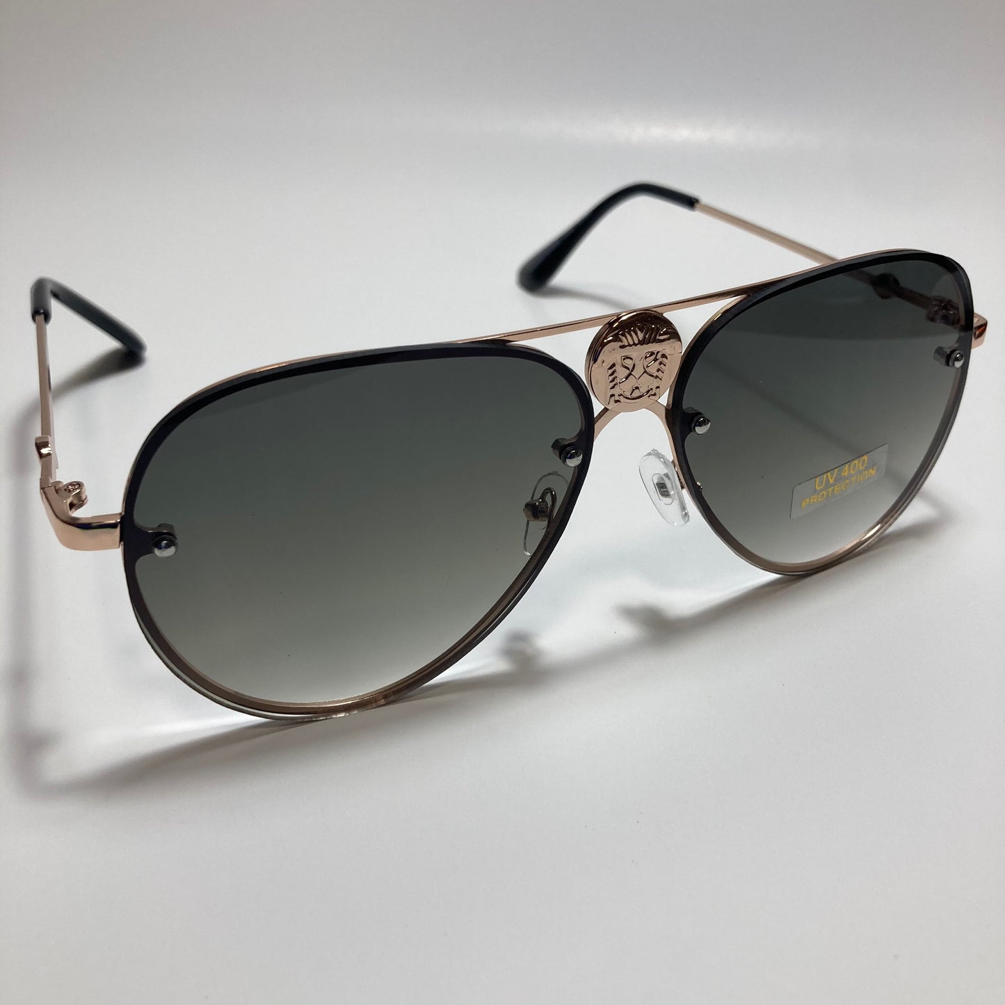 mens and womens gold and green aviator sunglasses