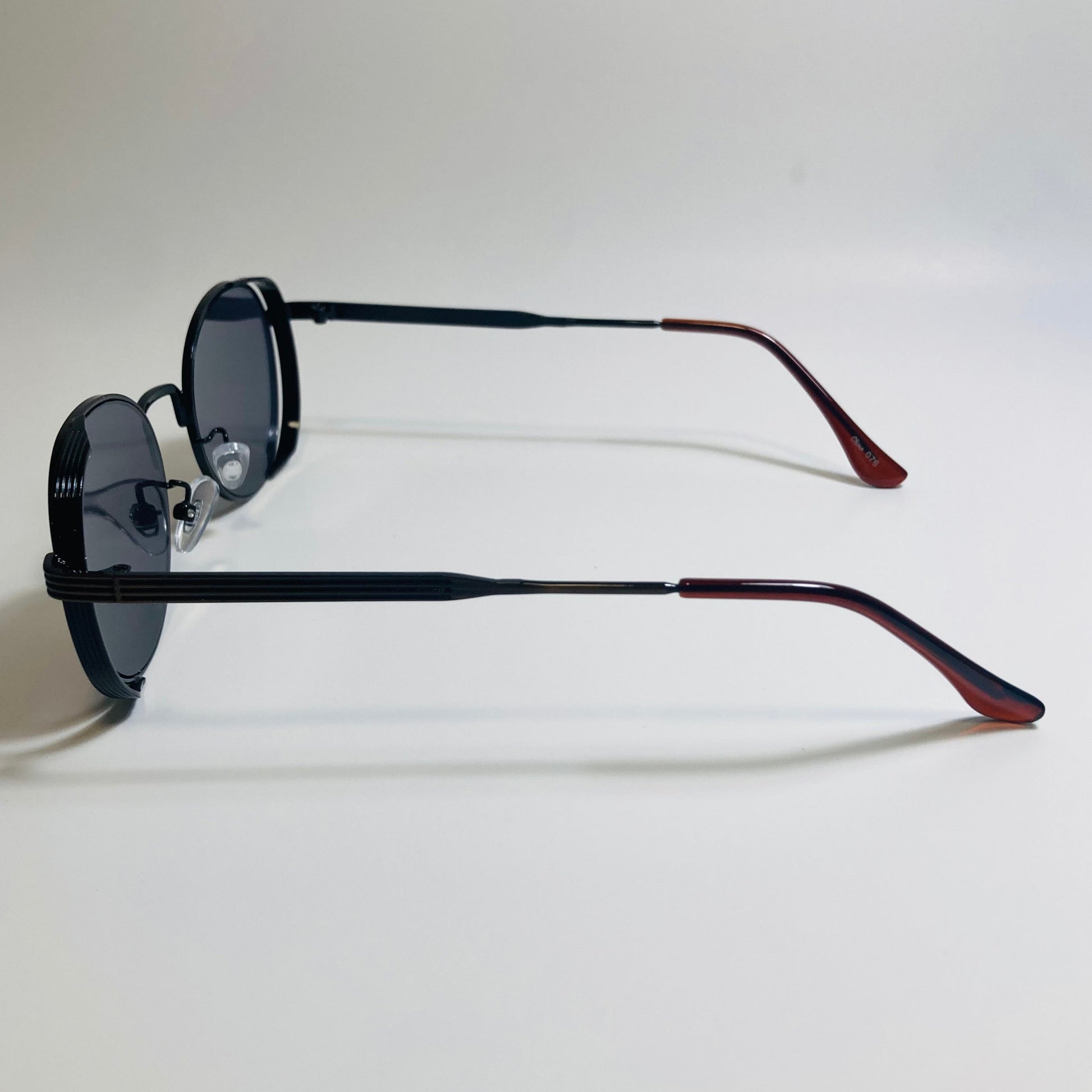 mens and womens bronze and black metal frame side shield y2k sunglasses