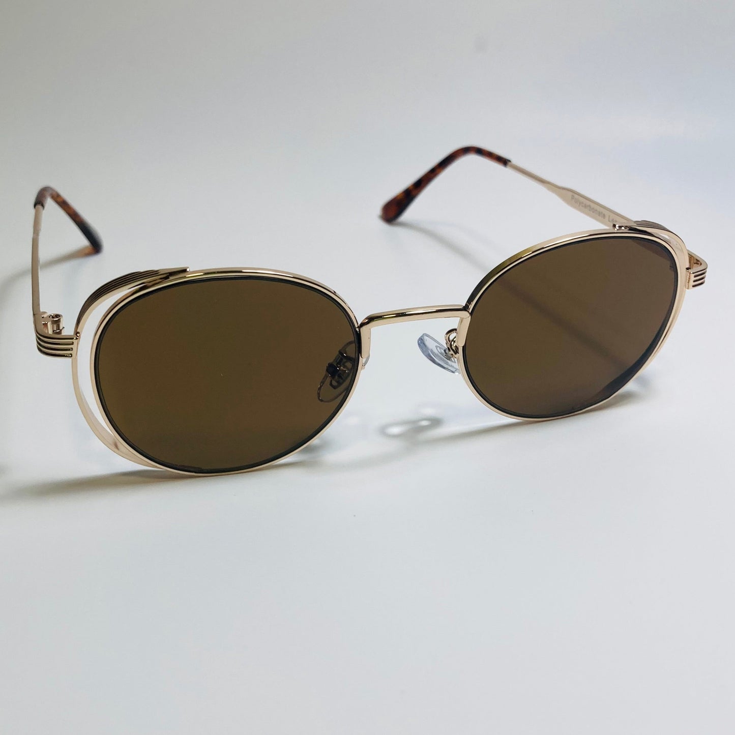 mens and womens gold and brown metal frame side shield y2k sunglasses