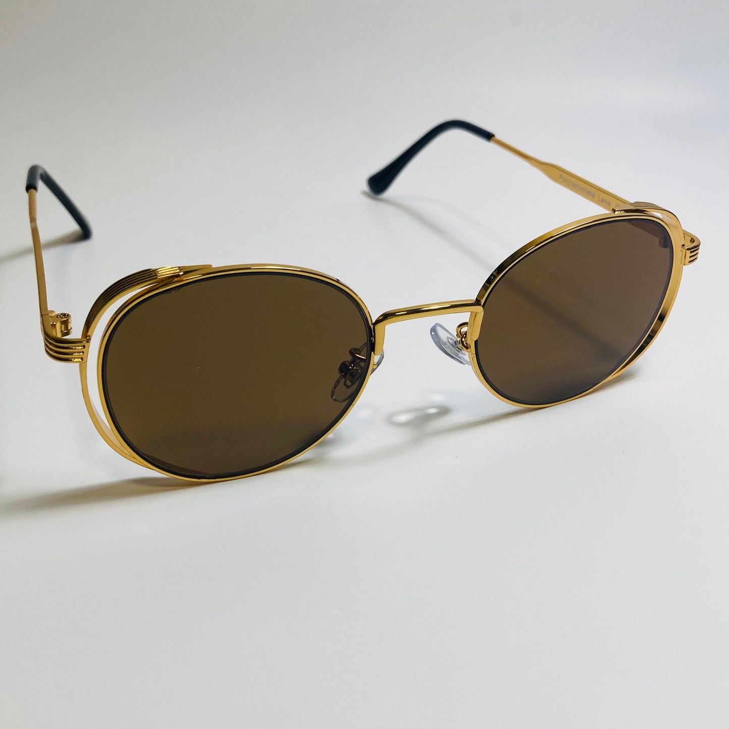 mens and womens gold and brown metal frame side shield y2k sunglasses