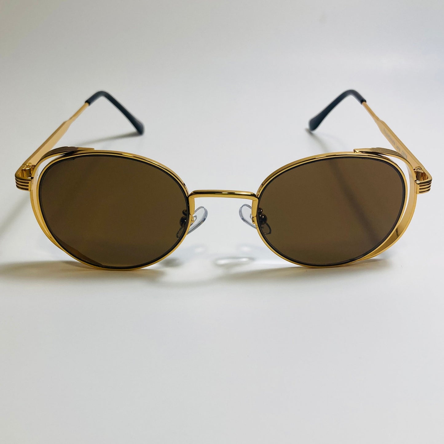 mens and womens gold and brown metal frame side shield y2k sunglasses