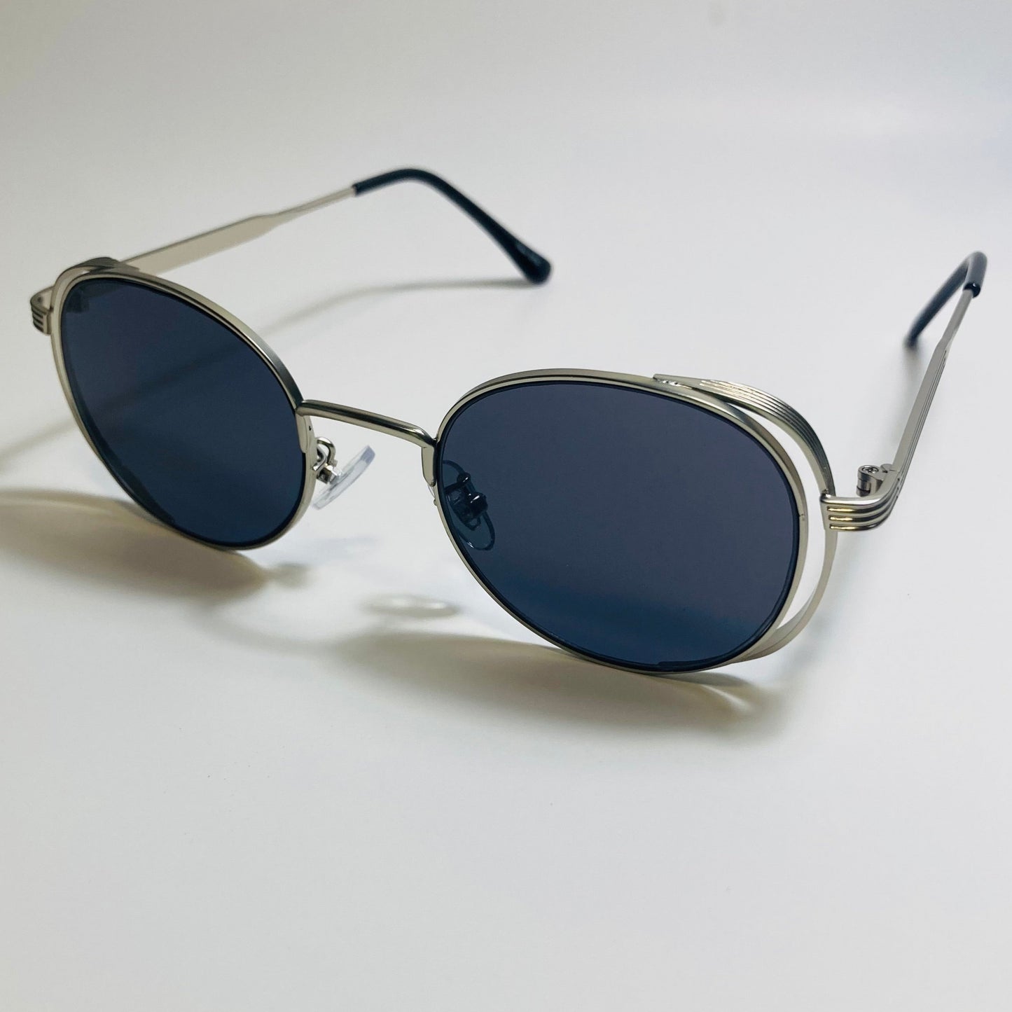 mens and womens silver and black metal frame side shield y2k sunglasses