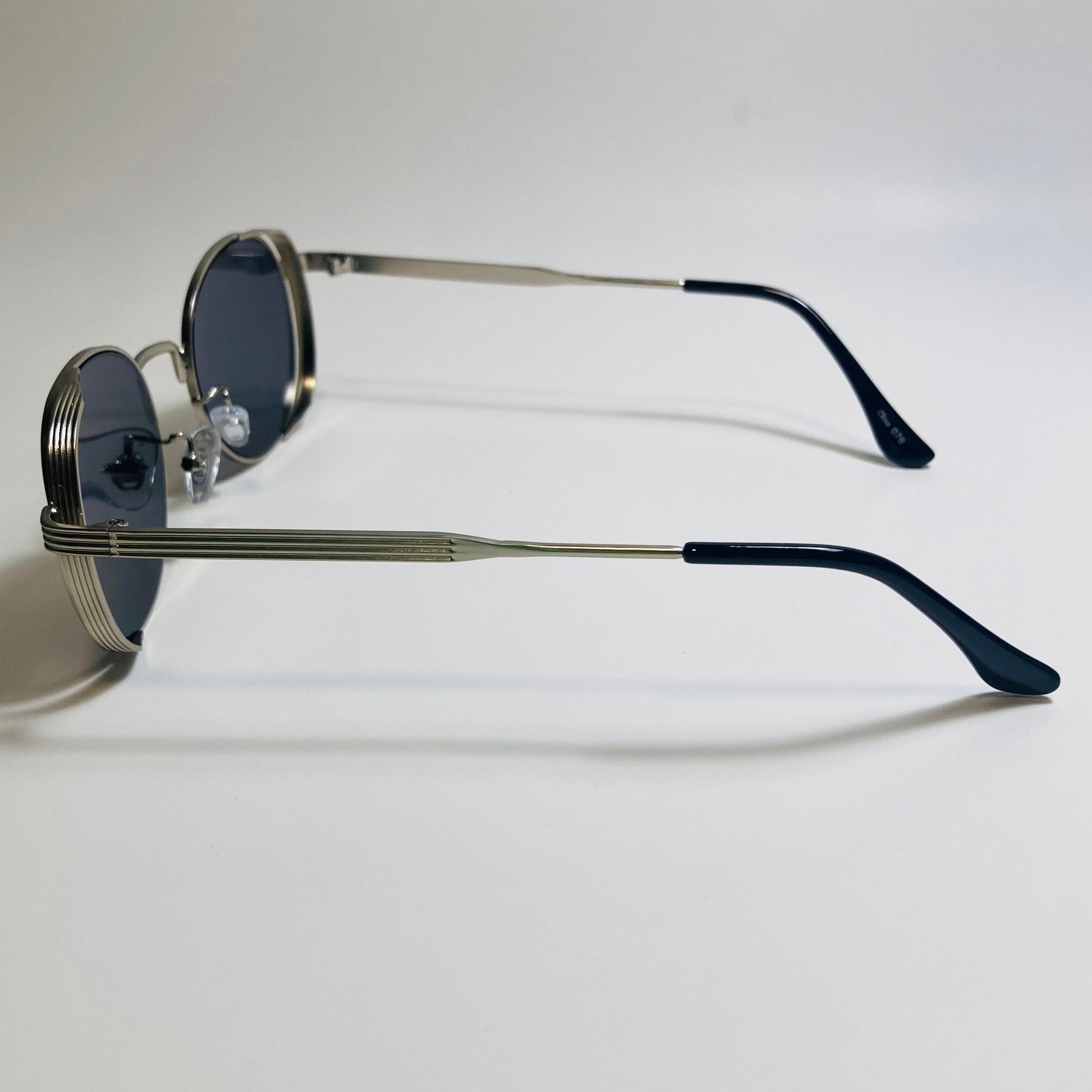 mens and womens silver and black metal frame side shield y2k sunglasses