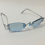 mens and womens silver and blue small rimless sunglasses