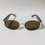 mens and womens brown and gold round sunglasses 