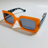 womens orange and black square sunglasses