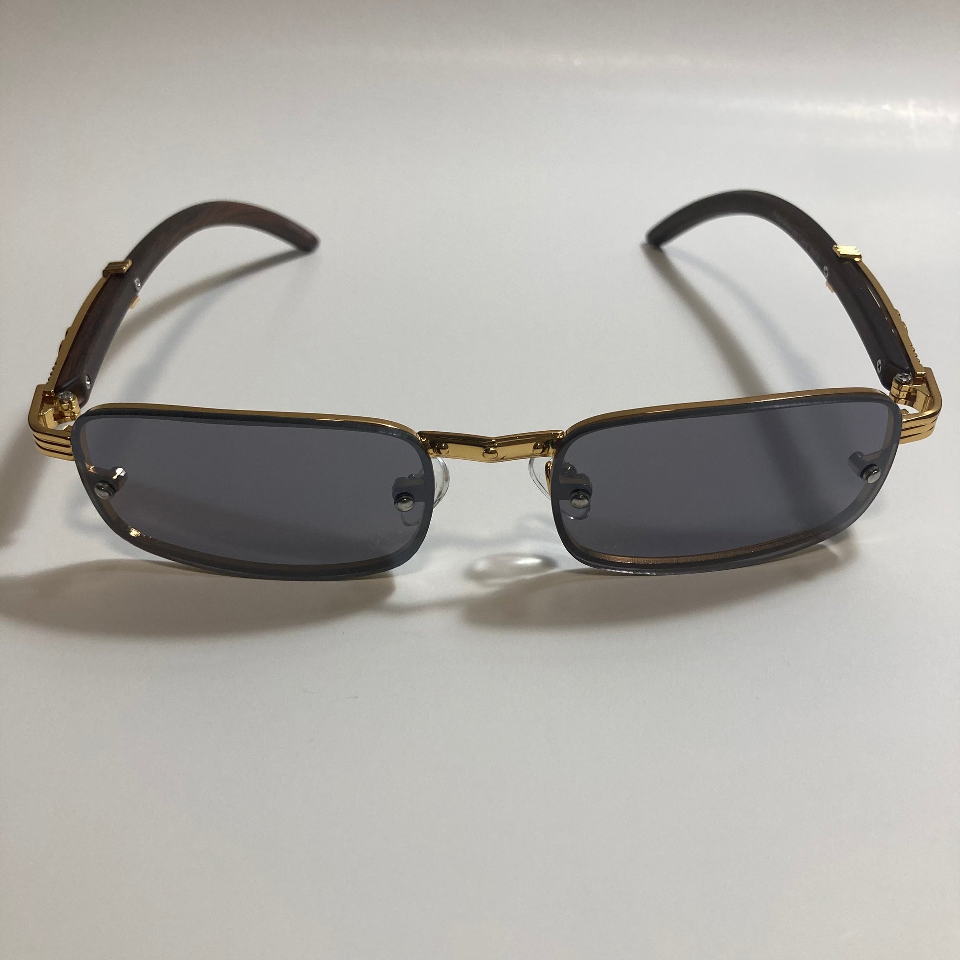 mens and womens black and gold square sunglasses 