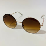 womens brown and gold oversize round sunglasses