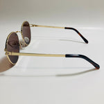 mens and womens brown and gold metal round sunglasses