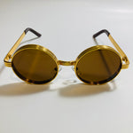 mens and womens brown and gold round steampunk sunglases