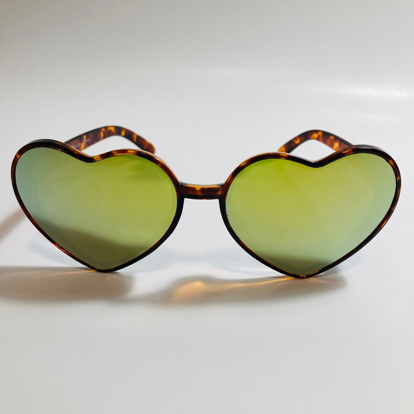 brown and green mirrored heart shape sunglasses