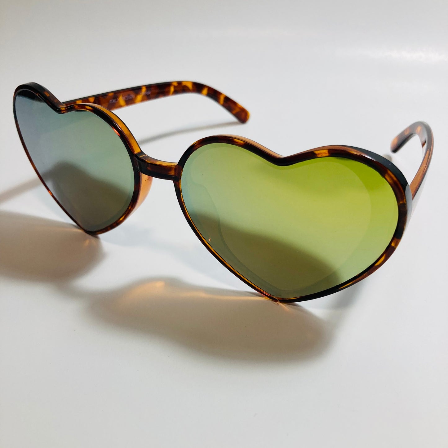 brown and green mirrored heart shape sunglasses