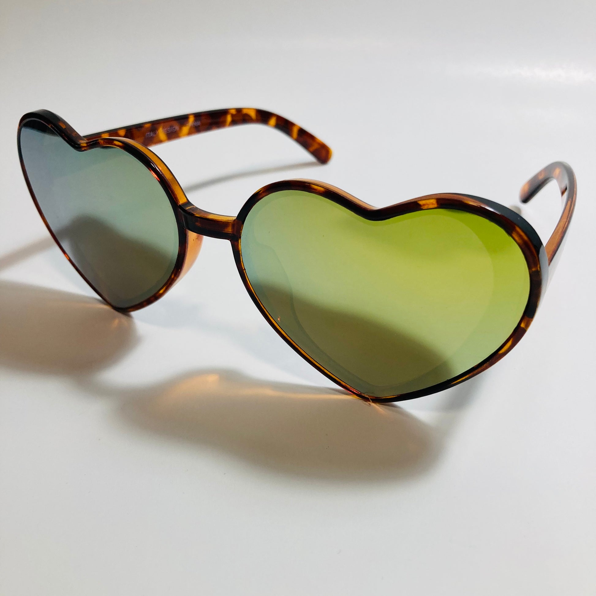 brown and green mirrored heart shape sunglasses