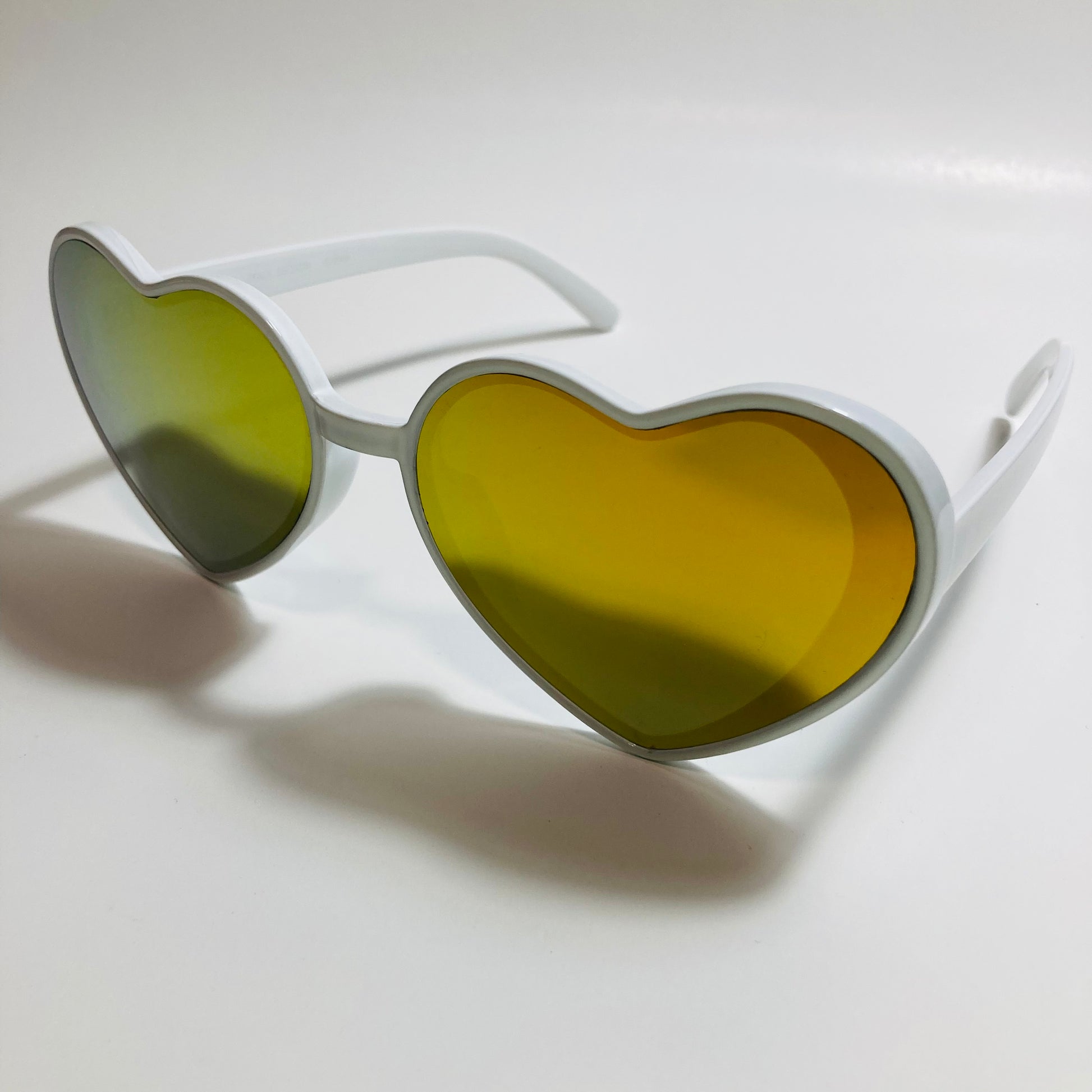 white and yellow mirrored heart shape sunglasses