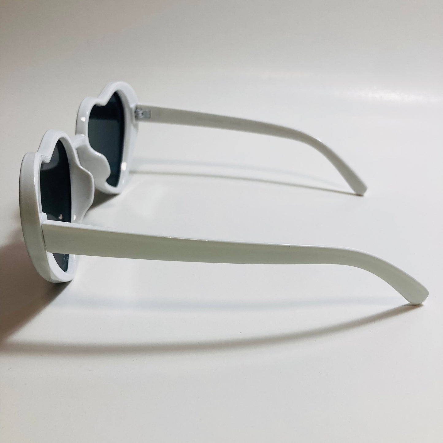 white and yellow mirrored heart shape sunglasses