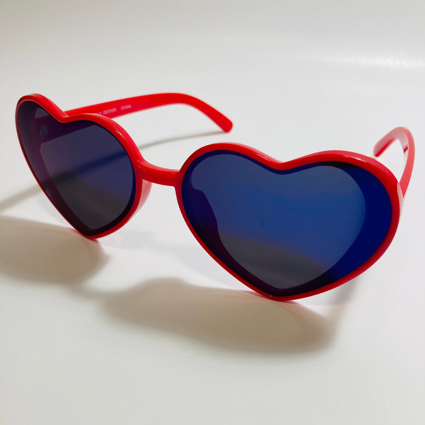 red and blue mirrored heart shape sunglasses