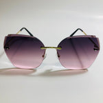 womens black and pink oversize rimless sunglasses