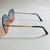 womens pink and blue oversize rimless sunglasses