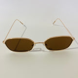 mens and womens brown and gold oval sunglasses 