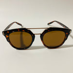 mens and womens brown and gold round sunglasses with crossbar